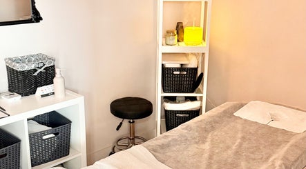 Cozy massage room at Velora Studio Massage inside Collective Salon, Portsmouth, England, GB.
