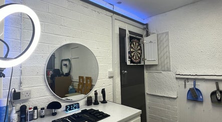 Modern barber station at Cutzby_OH with grooming tools and decor in Bristol, England, GB.