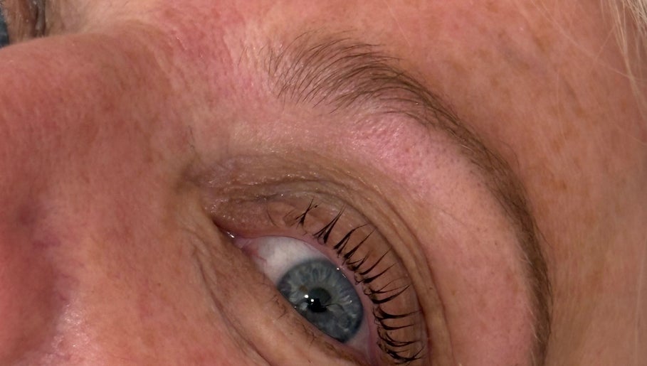 Close-up of a well-groomed eye with curled lashes at BeautyByElls, Riddings, England, GB.