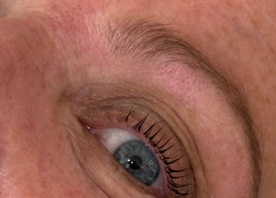 Close-up of a well-groomed eye with curled lashes at BeautyByElls, Riddings, England, GB.