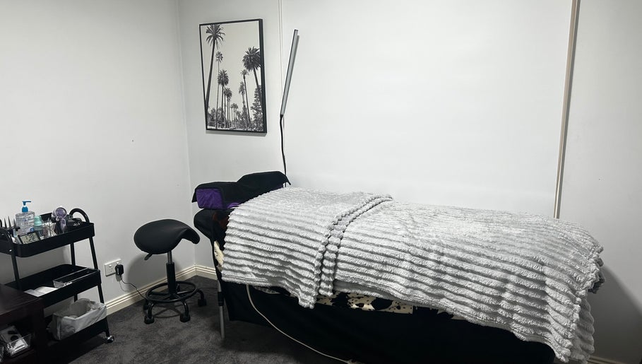 Inviting treatment room at The Lash Bar By Holly in Nagambie, Victoria, AU featuring a comfy bed and sleek decor.