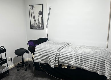 Inviting treatment room at The Lash Bar By Holly in Nagambie, Victoria, AU featuring a comfy bed and sleek decor.