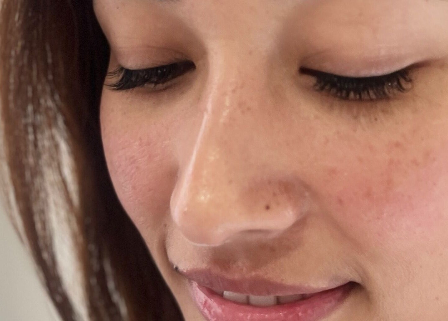 Close-up of serene face receiving beauty treatment at Beckyy’s Glam Atelier, Modbury North, South Australia, AU.