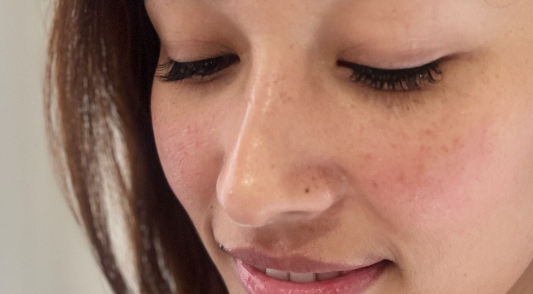 Close-up of serene face receiving beauty treatment at Beckyy’s Glam Atelier, Modbury North, South Australia, AU.