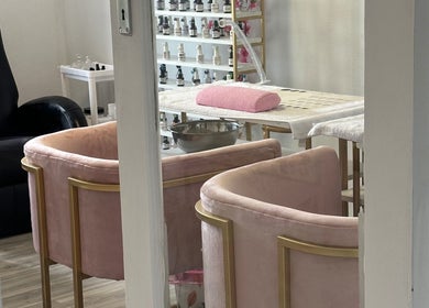 Elegant pink chairs and spa treatment area at Noella Mobile Spa, Cape Town, Western Cape, ZA.