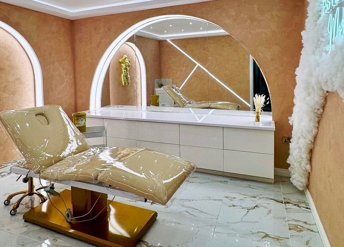 Luxurious beauty room at The Calm Lab, Conisbrough, England, GB with plush chair and artistic decor.