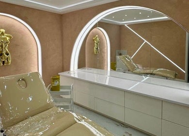 Luxurious therapy room at The Calm Lab, Conisbrough, England, GB with plush chair and elegant decor.