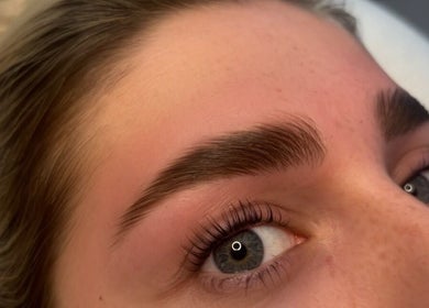 Close-up of expertly shaped eyebrows at Enhanced by Lily, Crewe, England, GB showcasing precision and style.