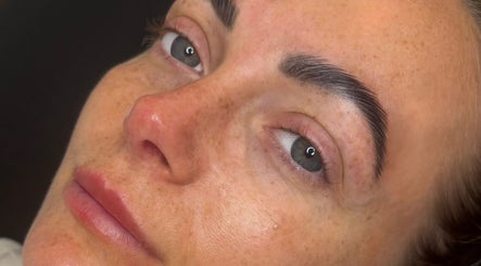 Close-up of smooth skin and perfectly shaped brows at Enhanced by Lily, Crewe, England, GB.