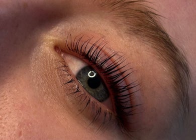 Close-up of enhanced eyelashes at Enhanced by Lily, Crewe, England, GB. Highlights expert beauty services.