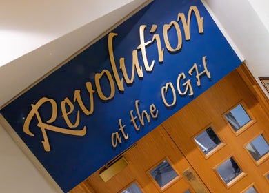 Entrance to Feel Good Fitness in Guernsey, Saint-pierre-port, GG with elegant blue and gold signage.