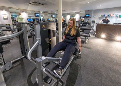 Woman using leg press at Feel Good Fitness, Guernsey, Saint-pierre-port, GG.
