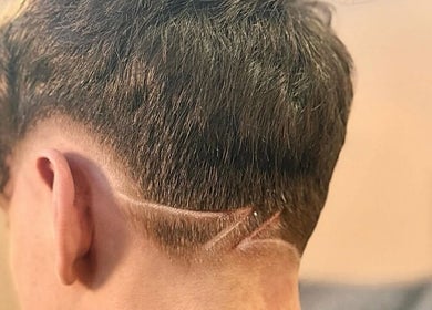 Stylish undercut hairstyle crafted at ASTROTRIMZ/THE FUTURE PLUS in Bedford, England, GB.
