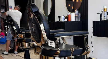 Elegant salon chairs at ASTROTRIMZ/THE FUTURE PLUS, Bedford, England, GB, set against modern interior decor.