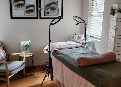 Cozy treatment room at Ella Belle Beauty Studio, Cape Town, Western Cape, ZA, featuring elegant decor and ambient lighting.