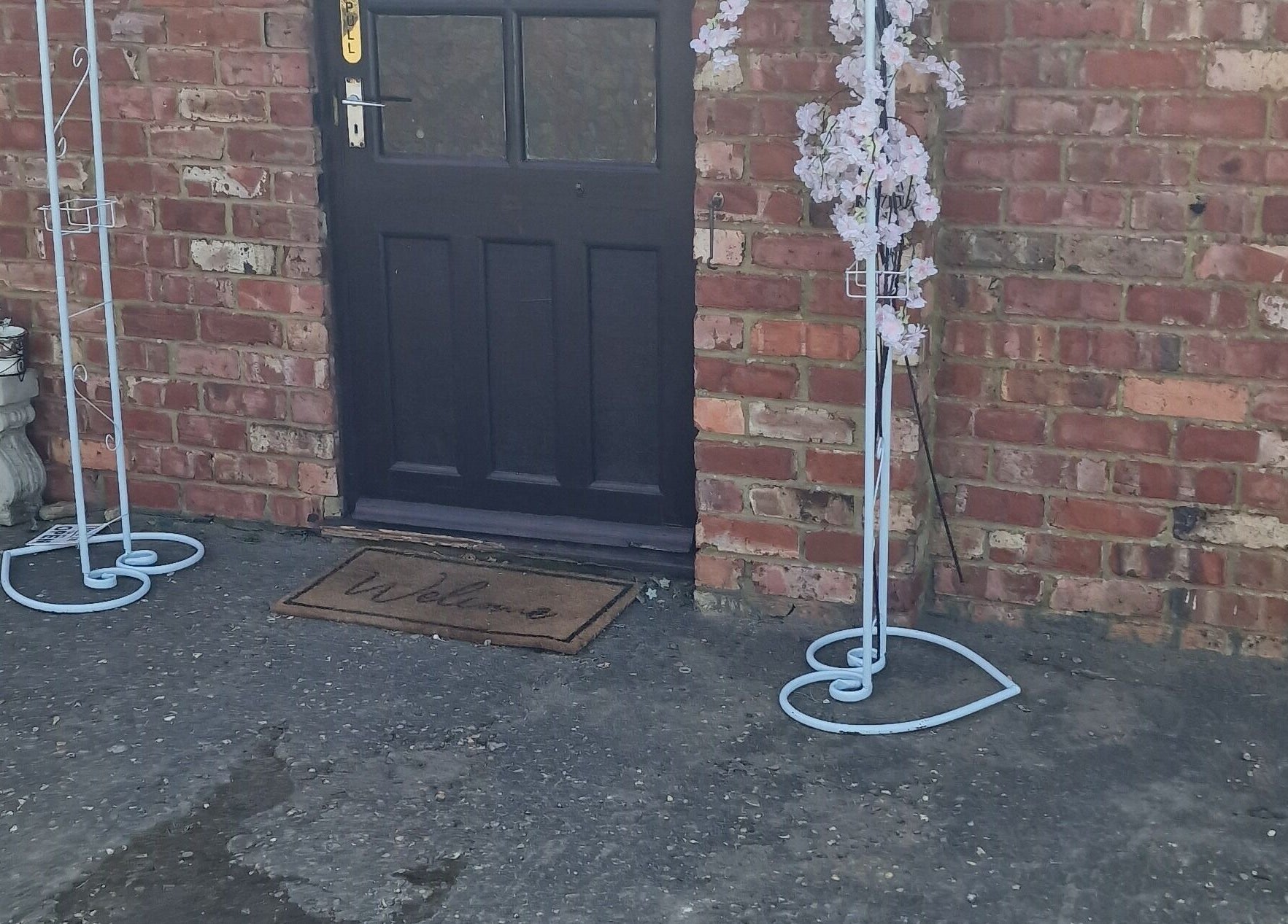 Welcoming entrance to SA_Holistics in Irchester, England, GB with elegant decor and a warm ambiance.