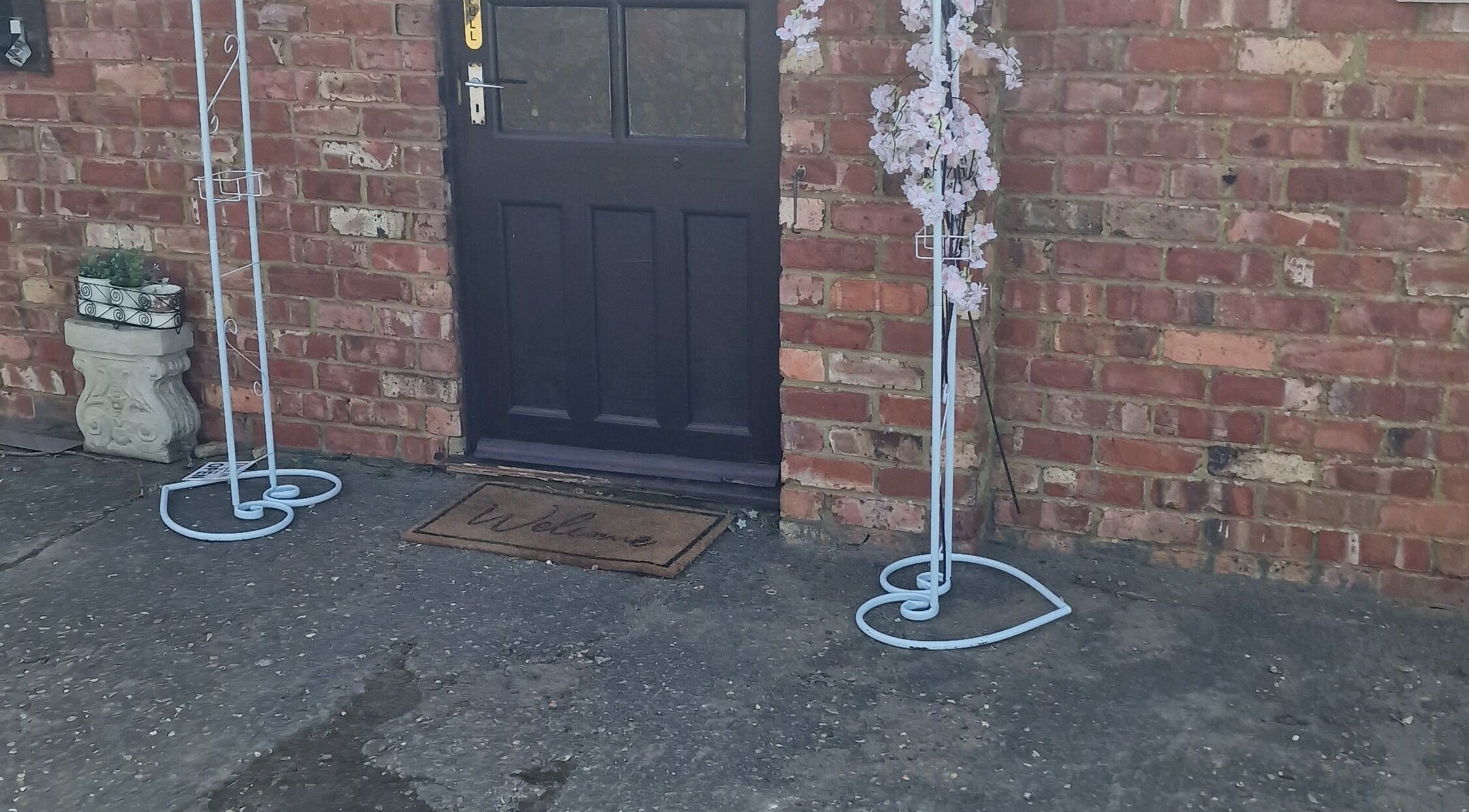 Welcoming entrance to SA_Holistics in Irchester, England, GB with elegant decor and a warm ambiance.