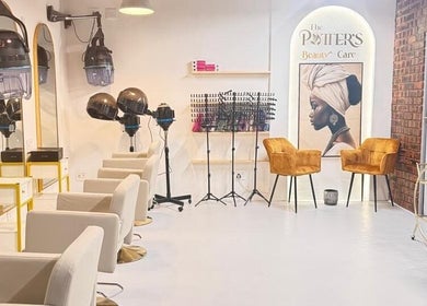 Modern salon interior at The Potter's Beauty Care in Cape Town, Western Cape, ZA with stylish chairs and art.
