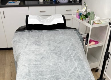 Treatment bed at Lch Beauty in Dalkeith, Scotland, GB, ready for wellness services.