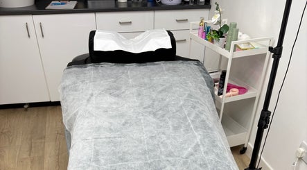 Treatment bed at Lch Beauty in Dalkeith, Scotland, GB, ready for wellness services.