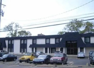 Exterior view of Yadior Beauty, Southfield, Michigan, US, showcasing modern architecture and parking area.