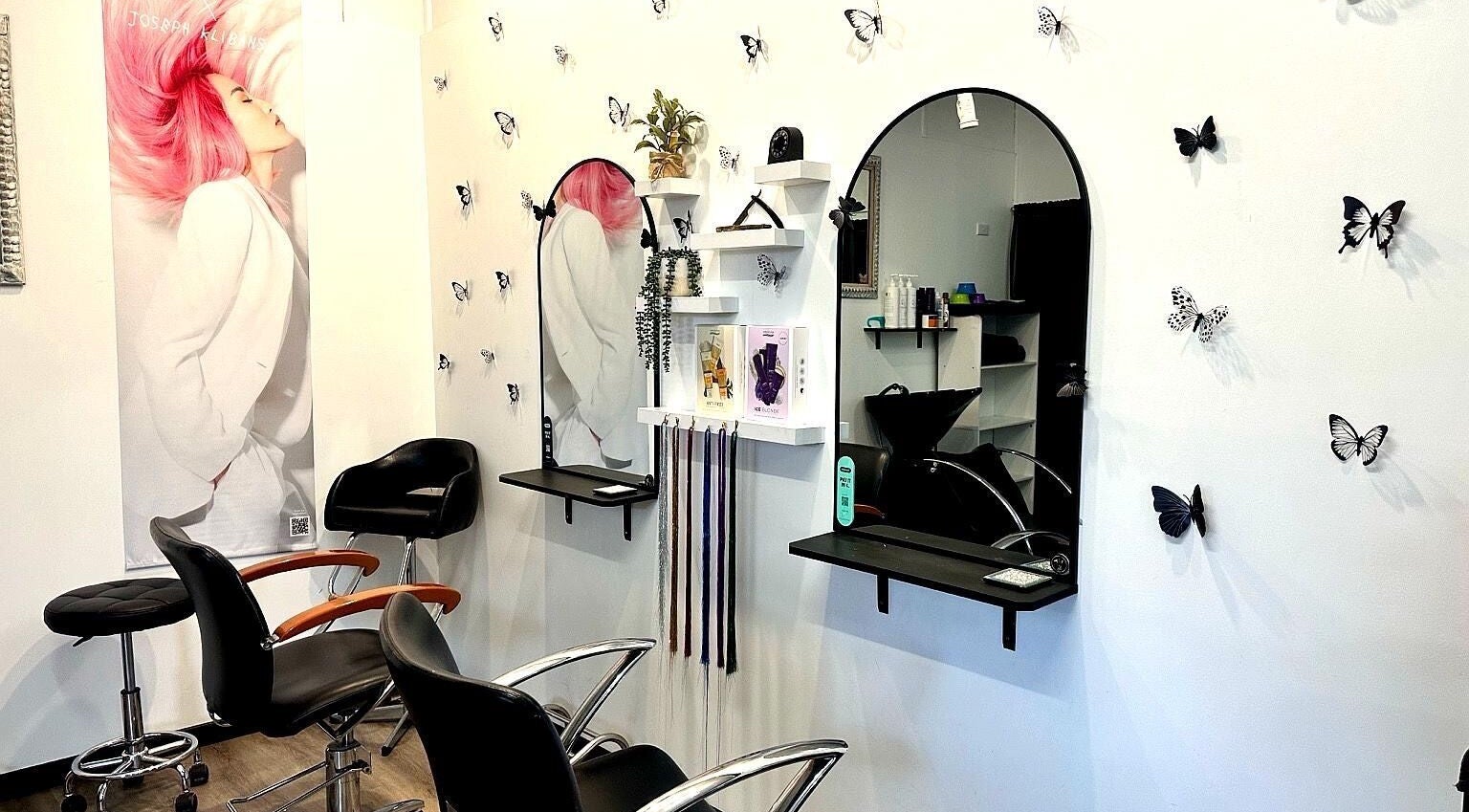Elegant styling chairs and mirrors at The Hair Barn Toolleen, Toolleen, Victoria, AU, with butterfly decor.