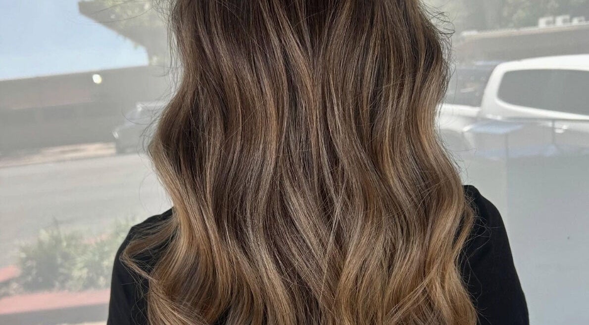 Elegant wavy hairstyle at Hair Divine Studio, Mount Isa, Queensland, AU.