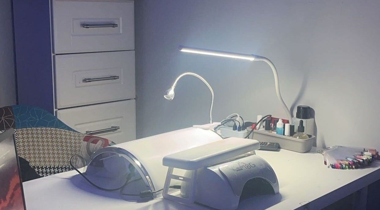 Nailssbybeccax nail station in Ballina, County Mayo, IE, showcasing manicure tools and products.