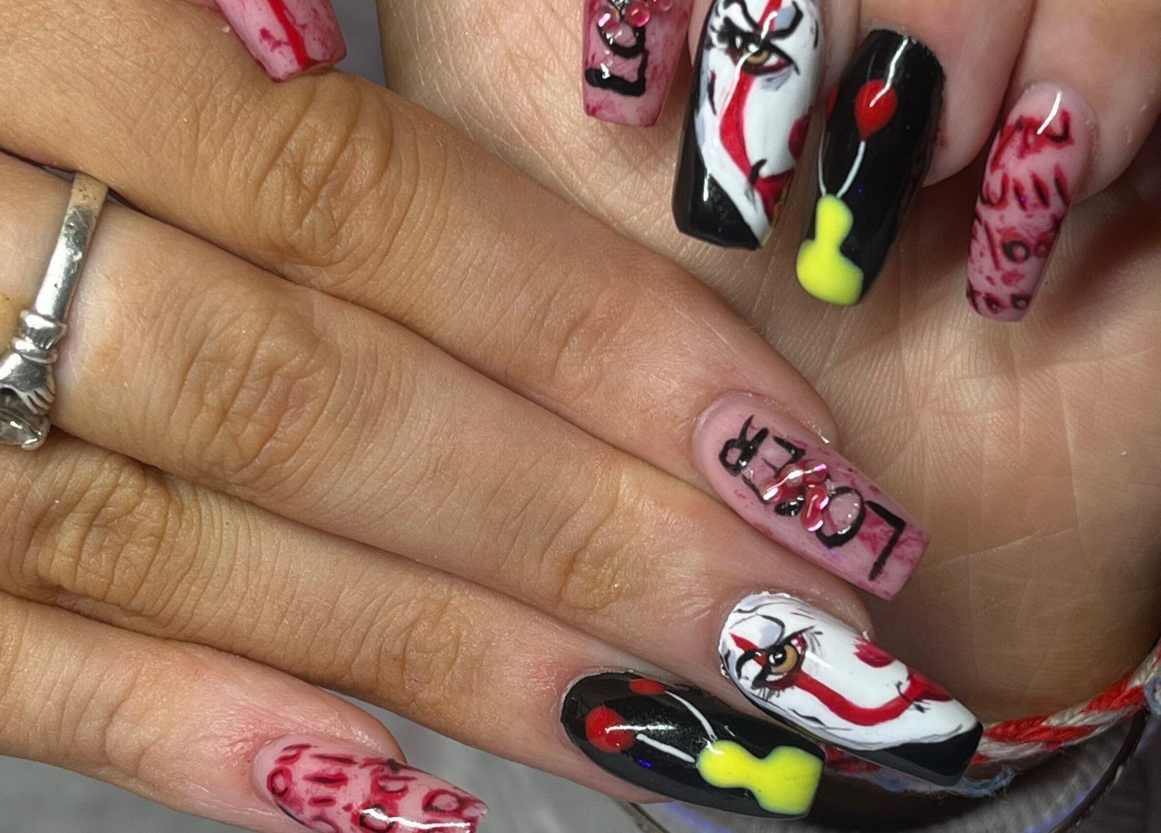 Creative nail art at Nailssbybeccax in Ballina, County Mayo, IE showcasing intricate, colorful designs.