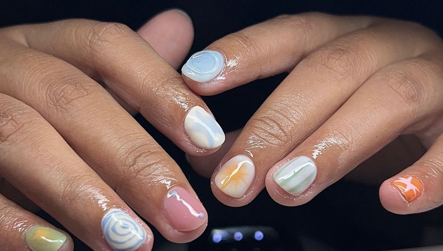 Colorful nail art at VOULOIR, San Jose Del Monte, Central Luzon, PH, showcasing detailed, vibrant designs.