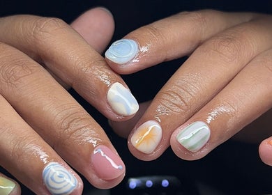 Colorful nail art at VOULOIR, San Jose Del Monte, Central Luzon, PH, showcasing detailed, vibrant designs.