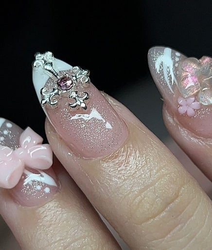 Elegant 3D nail art design with gems and bows at VOULOIR, San Jose Del Monte, Central Luzon, PH.