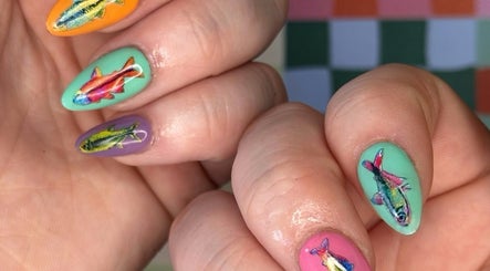 Colorful fish nail art from Manifested Nails, Port Jervis, New York, US.
