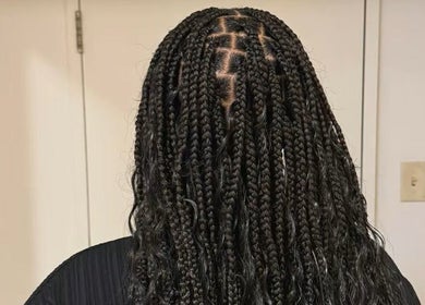 Intricate braids showcased at GELA'SHAIR, Ottawa, Ontario, CA, highlighting expert hair styling.