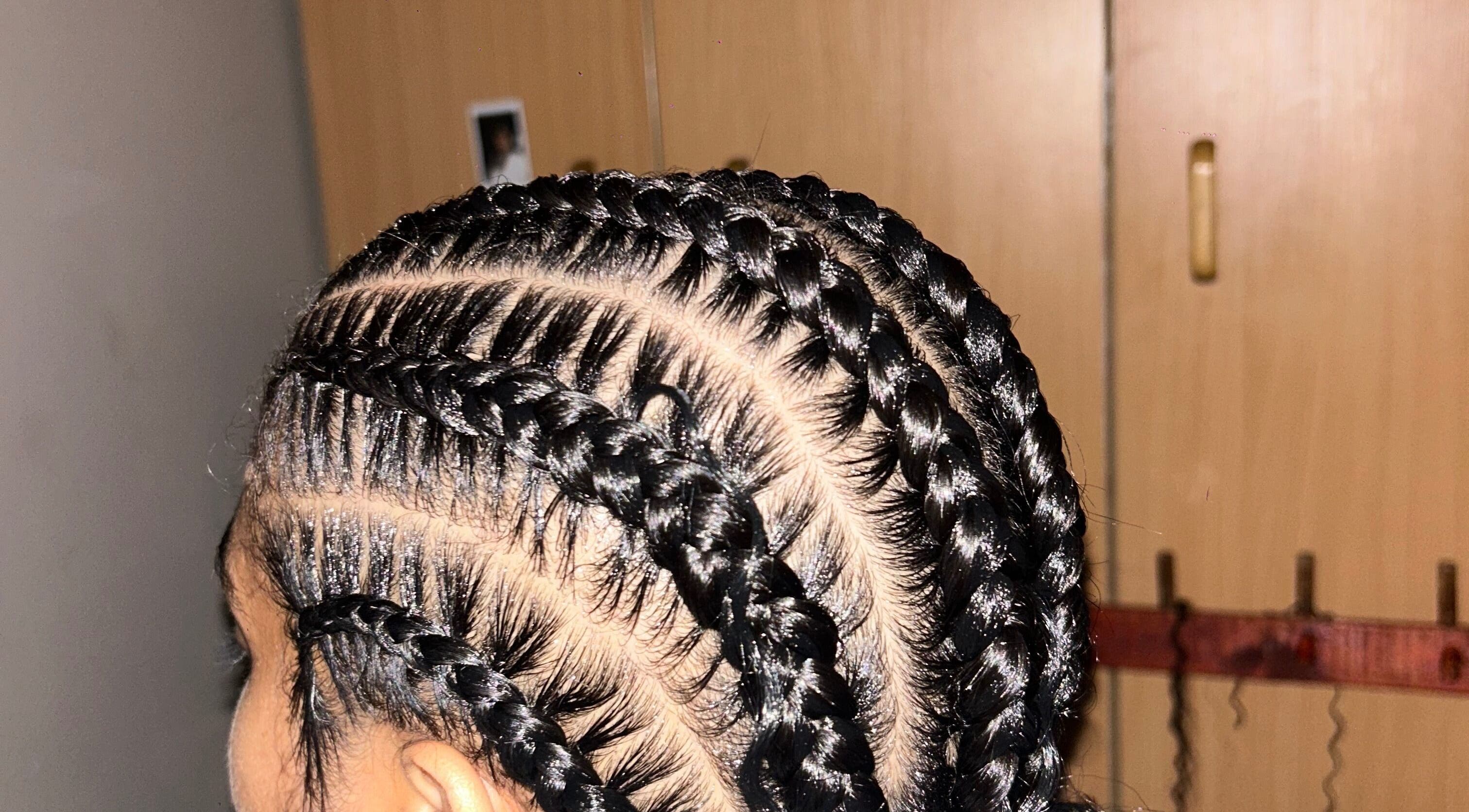 Intricate braided hairstyle at Braidbabes in Cape Town, Western Cape, ZA showcasing expert techniques.