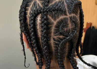 Intricate braiding style at Braidbabes, Cape Town, Western Cape, ZA showcasing creative hair artistry.