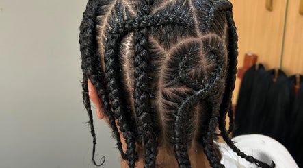 Intricate braiding style at Braidbabes, Cape Town, Western Cape, ZA showcasing creative hair artistry.