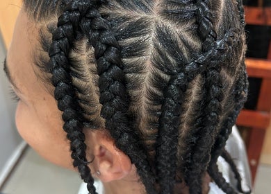 Detailed braiding style at Braidbabes, Cape Town, Western Cape, ZA, showcasing expert craftsmanship.