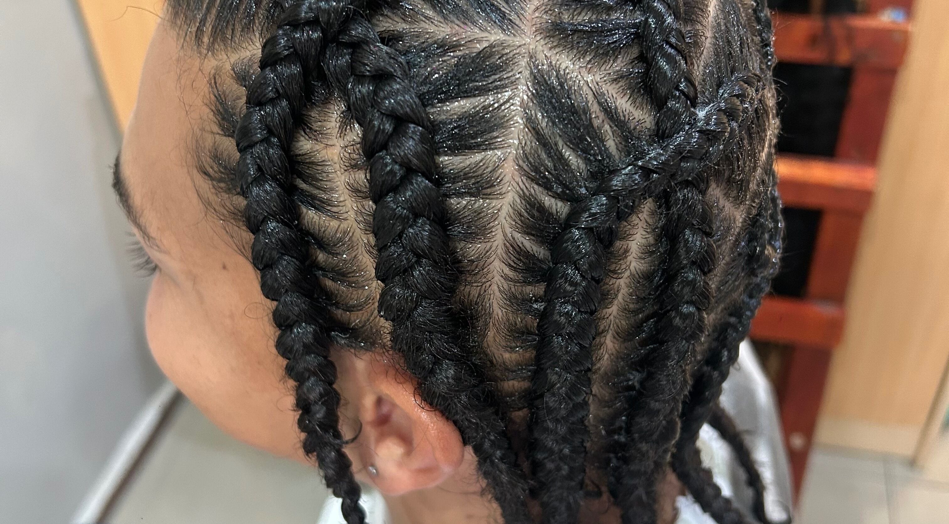 Detailed braiding style at Braidbabes, Cape Town, Western Cape, ZA, showcasing expert craftsmanship.
