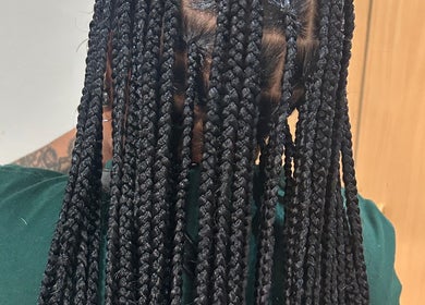 Intricate box braids hairstyle at Braidbabes in Cape Town, Western Cape, ZA.
