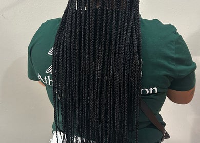 Intricate long braids at Braidbabes, Cape Town, Western Cape, ZA salon showcase professional style.