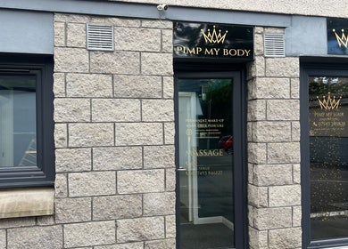 Get Em Treatments entrance in Aberdeen, Scotland, GB with stylish stone facade and elegant signage.