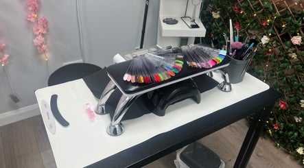 Nail art station at Get Em Treatments, Aberdeen, Scotland, GB with colorful palette and tools.