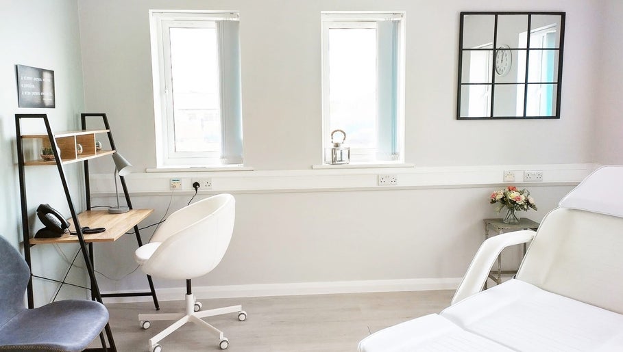 Modern treatment room at Weymouth Aesthetics Clinic, Weymouth, England, GB with sleek design and cozy ambiance.