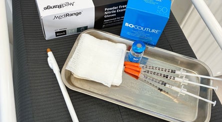 Medical supplies at Weymouth Aesthetics Clinic in Weymouth, England, GB, including syringes and gauze.