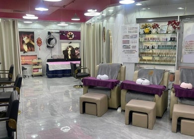 Interior of Lady Star Beauty Salon L.L.C, Dubai, Dubai, AE, showcasing luxurious styling chairs and nail stations.