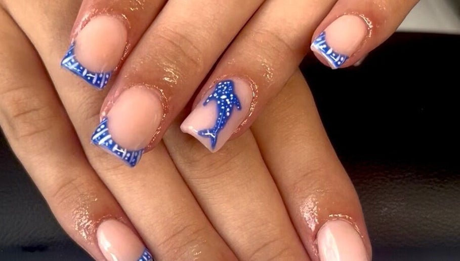 Intricate blue nautical nail art at Nailed it, Darlington, England, GB, showcasing creative manicure designs.