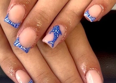 Intricate blue nautical nail art at Nailed it, Darlington, England, GB, showcasing creative manicure designs.
