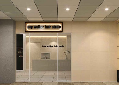Entrance of Tony Walker Hair Studio at Geylang Bahru MRT, SG with chic design and welcoming ambiance.