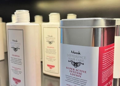 Shampoo and lotion bottles at Tony Walker Hair Studio, Geylang Bahru MRT, SG.